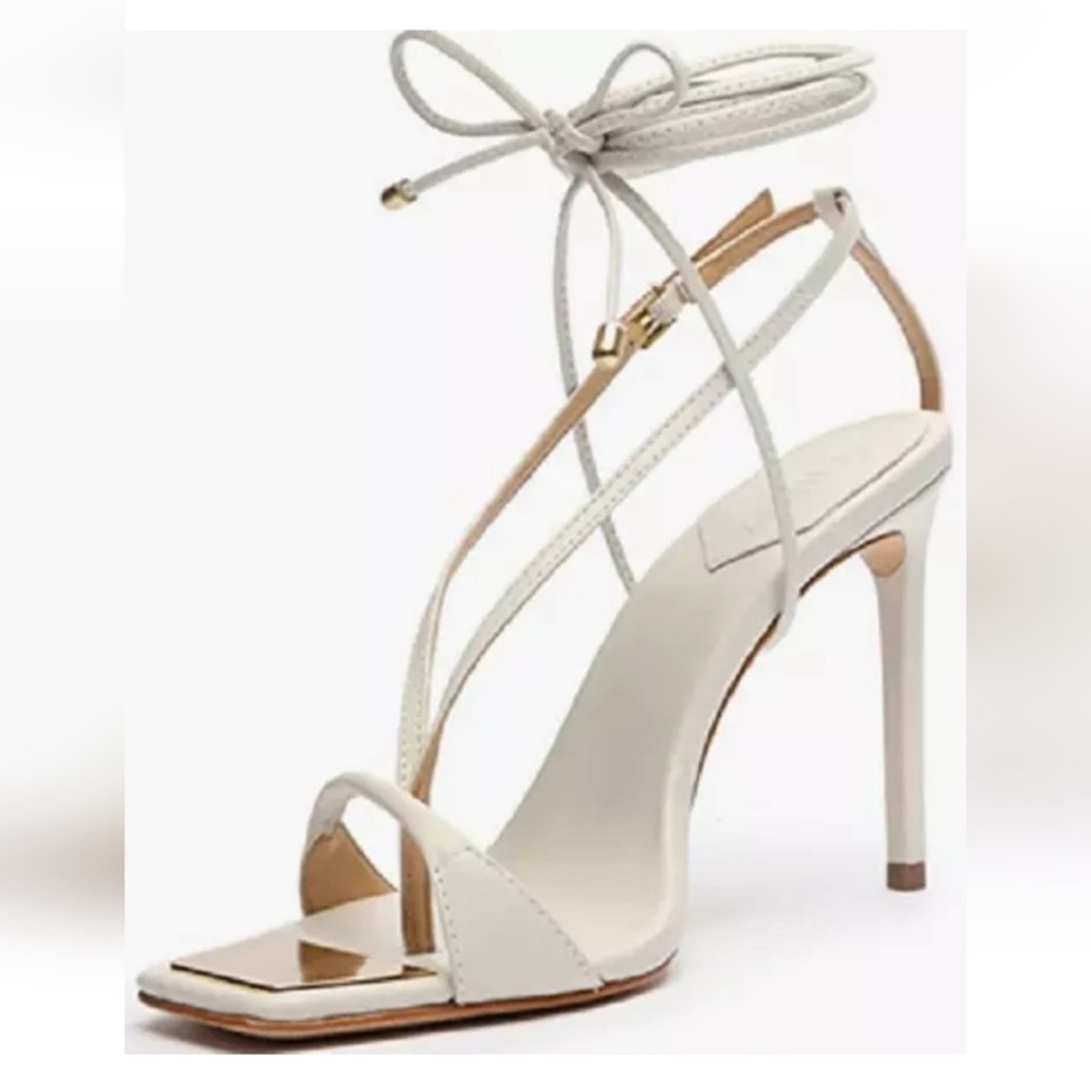 Schutz Vikki Strappy heeled sandals. Color: white